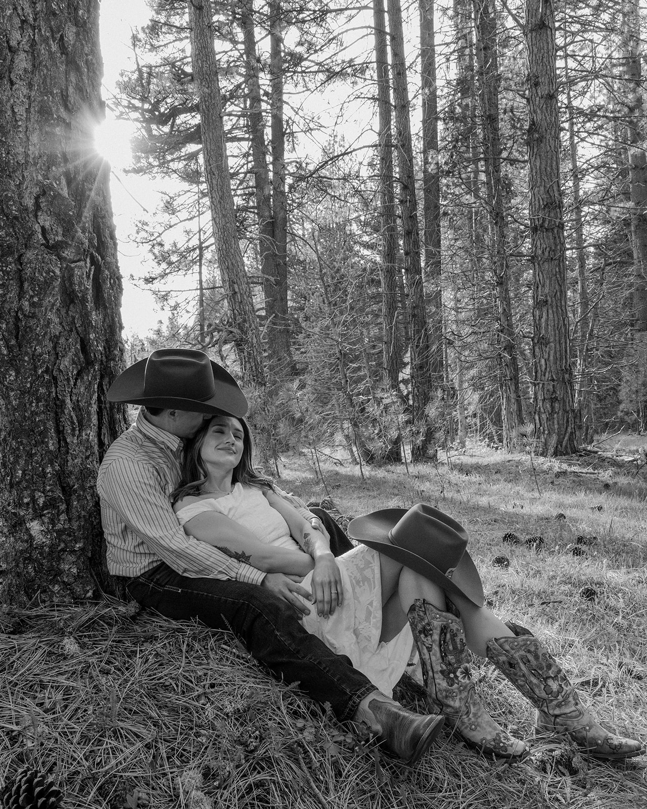 Madalyn and Hunter relaxing beneath the trees