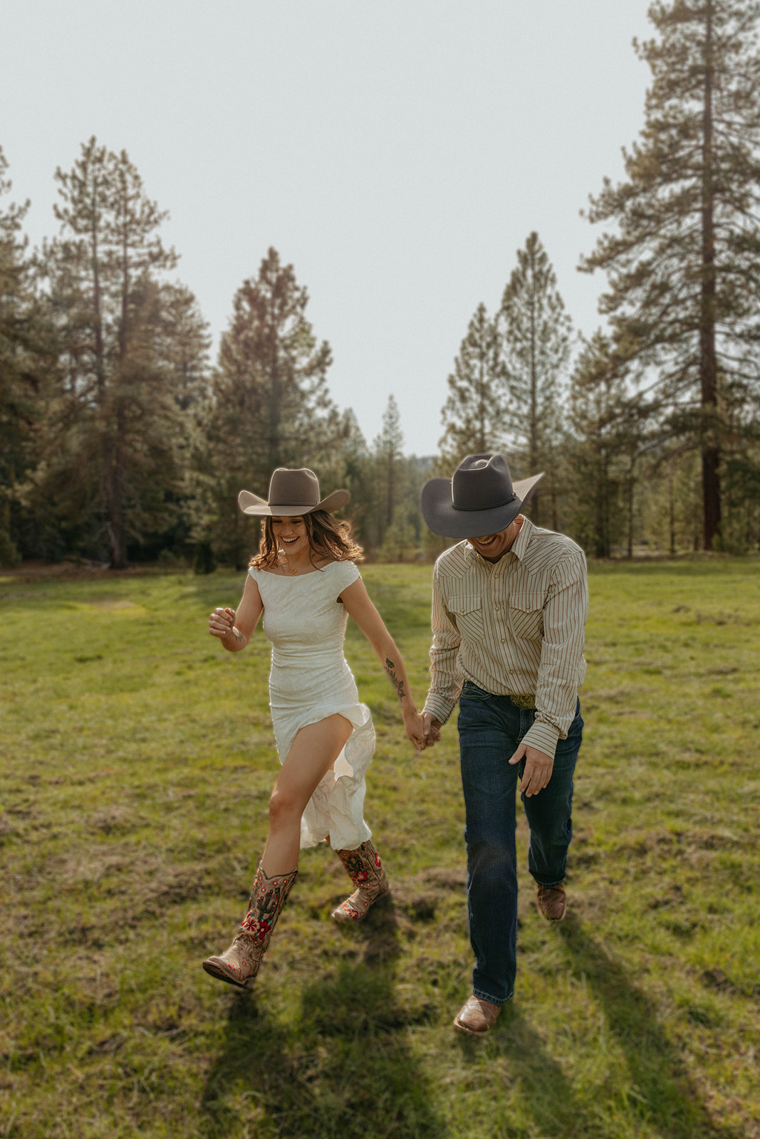 Madalyn and Hunter laughing while walking together